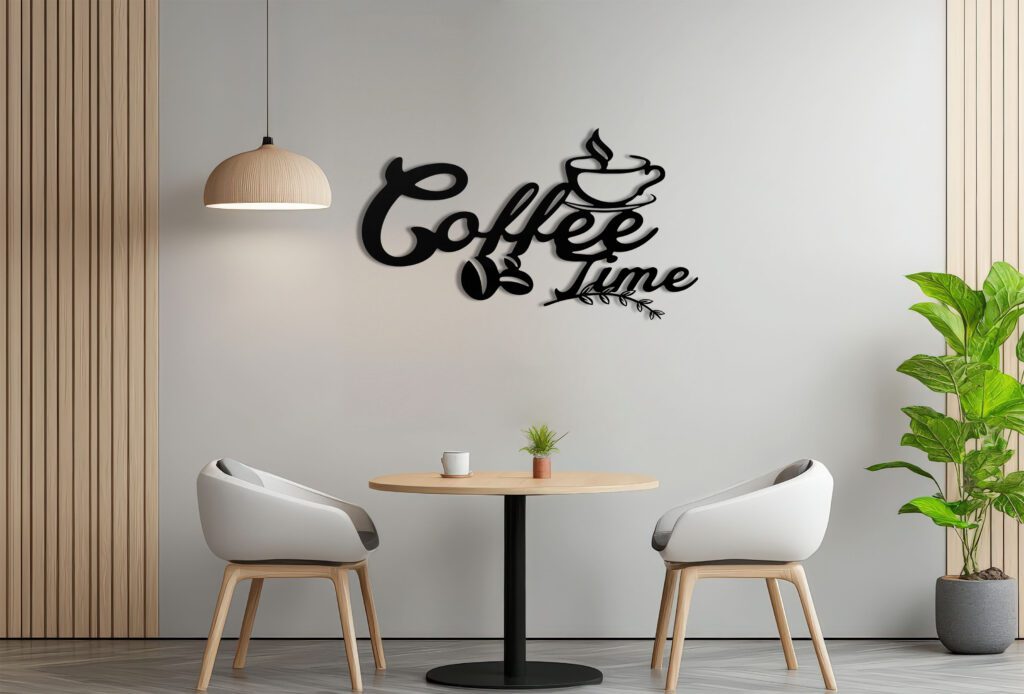 A white and orange framed picture hangs on a wall in a room with a table and two chairs